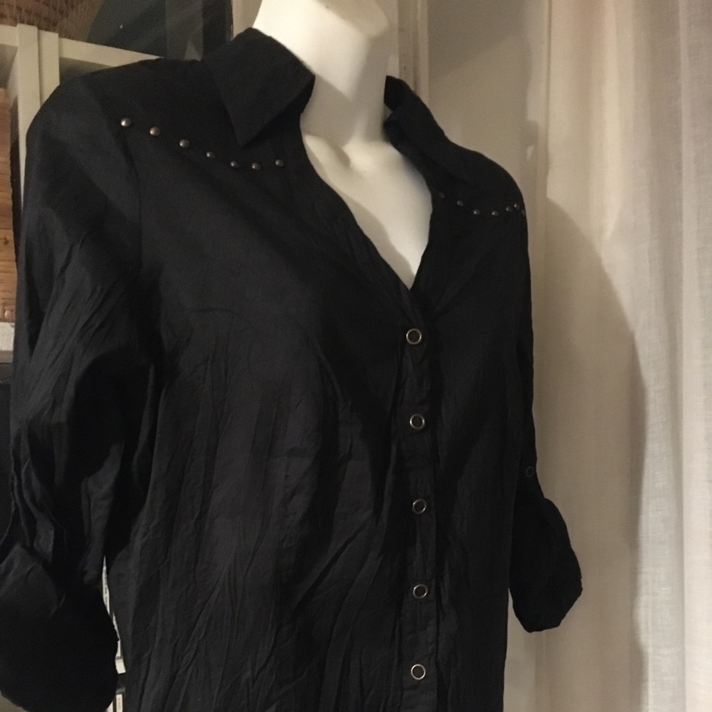 Woman’s western style snap down shirt.